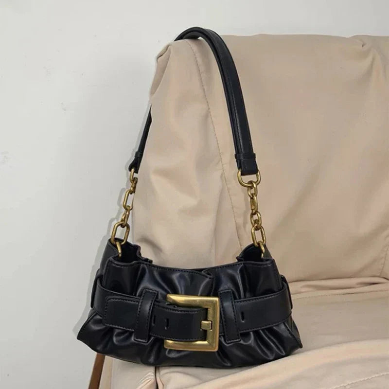Luxuriöse Damenhandtasche aus weichem Leder. Krokodilmuster Faltentasche