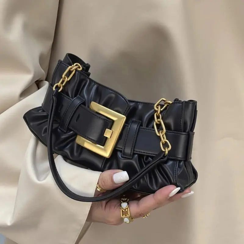 Luxuriöse Damenhandtasche aus weichem Leder. Krokodilmuster Faltentasche