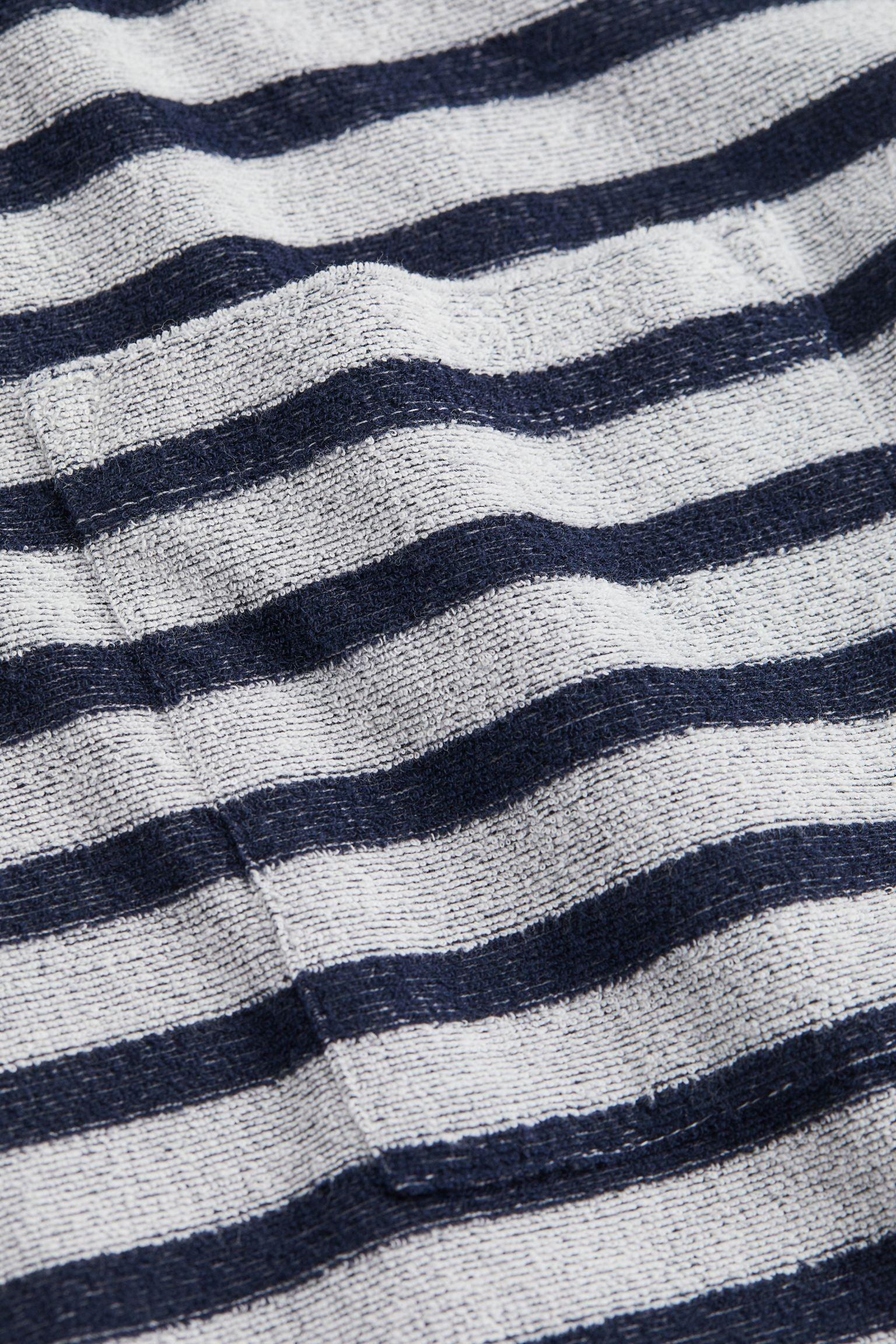 Gestreiftes Strick-Poloshirt | Maritime Eleganz mit modernem Touch