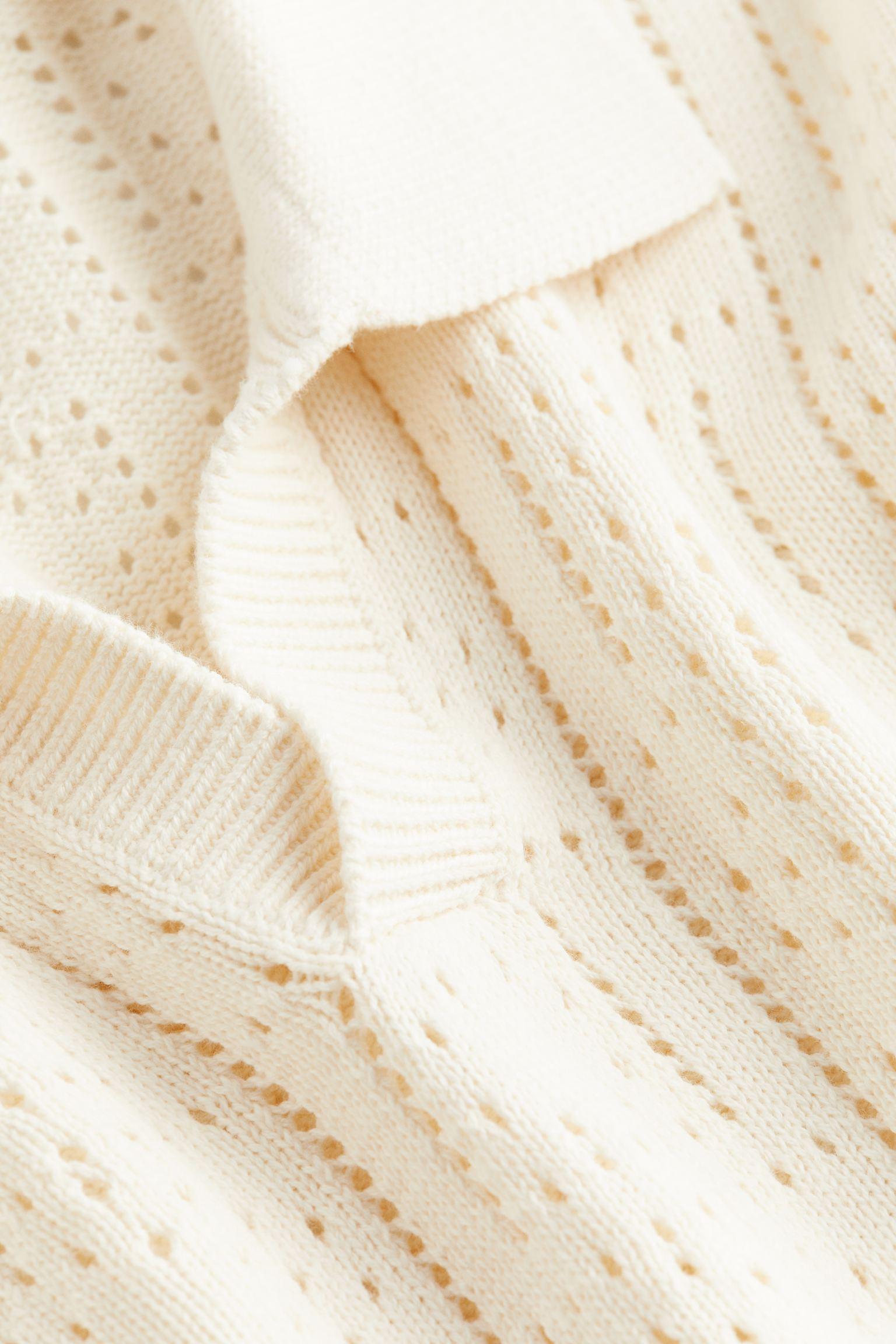 Eleganter Häkel-Strickpullover mit Polokragen