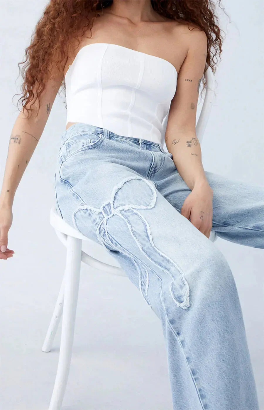 Trendige Wide-Leg Jeans mit Herz-Patch-Details